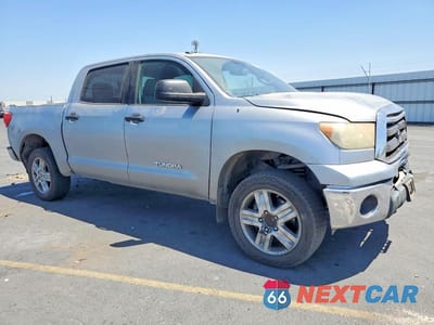 Czwarte zdjęcie samochodu z boku: 2012 TOYOTA TUNDRA CREWMAX SR5 VIN:5TFEY5F1XCX133291 - miniatura
