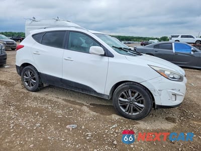 Czwarte zdjęcie samochodu z boku: 2015 HYUNDAI TUCSON SE VIN:KM8JUCAG1FU972709 - miniatura