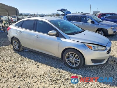 Czwarte zdjęcie samochodu z boku: 2016 FORD FOCUS SE VIN:1FADP3F26GL399440 - miniatura