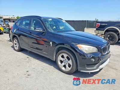 Czwarte zdjęcie samochodu z boku: 2015 BMW X1 SDRIVE28I VIN:WBAVM1C52FV314409 - miniatura