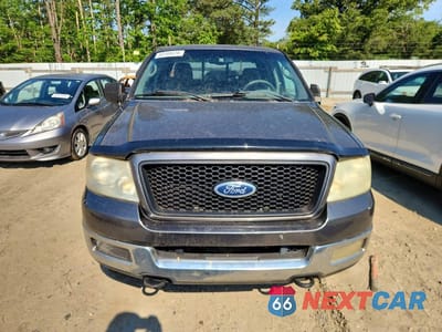 Piąte zdjęcie samochodu w środku: 2004 FORD F150 VIN:1FTPX14584NB56222 - miniatura