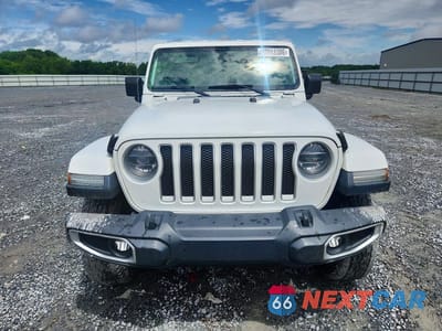 Piąte zdjęcie samochodu w środku: 2019 JEEP WRANGLER UNLIMITED SAHARA VIN:1C4HJXENXKW520963 - miniatura