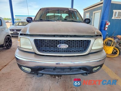 Piąte zdjęcie samochodu w środku: 2001 FORD F-150 VIN:1FTRW08L91KA08608 - miniatura
