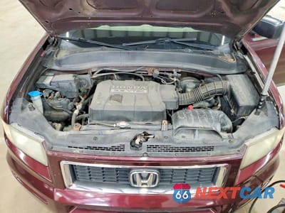 Zdjęcie 11 z 12 samochodu: 2008 HONDA RIDGELINE RTX VIN:2HJYK16388H502259 - miniatura