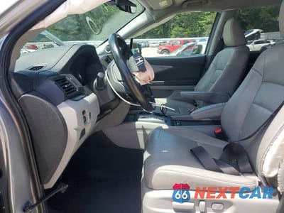 Zdjęcie 7 z 13 samochodu: 2021 HONDA PILOT EXL VIN:5FNYF5H53MB016599 - miniatura