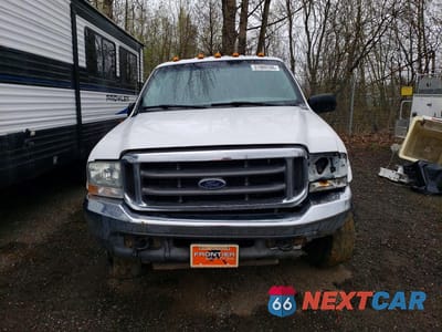 Piąte zdjęcie samochodu w środku: 2004 FORD F350 SRW SUPER DUTY VIN:1FTSW31P64EA47403 - miniatura