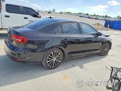 Trzecie zdjęcie samochodu z tyłu: 2016 VOLKSWAGEN JETTA SPORT VIN:3VWD17AJ8GM396472 - miniatura