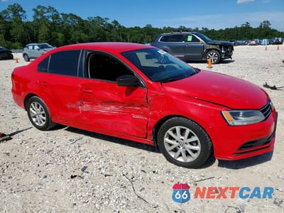 Czwarte zdjęcie samochodu z boku: 2015 VOLKSWAGEN JETTA SE VIN:3VWD17AJ2FM236764 - miniatura