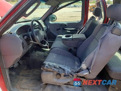 Zdjęcie 7 z 12 samochodu: 2003 FORD F150 VIN:1FTRX172X3NB39592 - miniatura