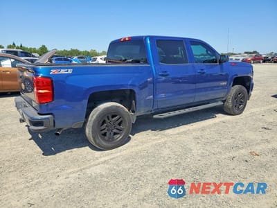 Trzecie zdjęcie samochodu z tyłu: 2016 CHEVROLET SILVERADO K1500 LT VIN:3GCUKREC2GG140799 - miniatura
