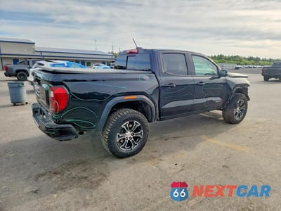 Trzecie zdjęcie samochodu z tyłu: 2024 GMC CANYON AT4 VIN:1GTP6DEK5R1318184 - miniatura