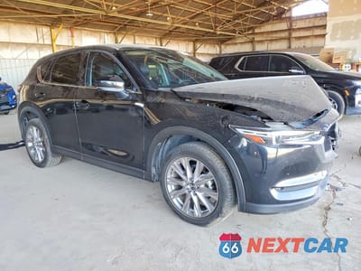 Czwarte zdjęcie samochodu z boku: 2020 MAZDA CX-5 GRAND TOURING VIN:JM3KFBDM3L0731372 - miniatura