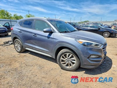 Czwarte zdjęcie samochodu z boku: 2017 HYUNDAI TUCSON SE VIN:KM8J33A41HU596234 - miniatura