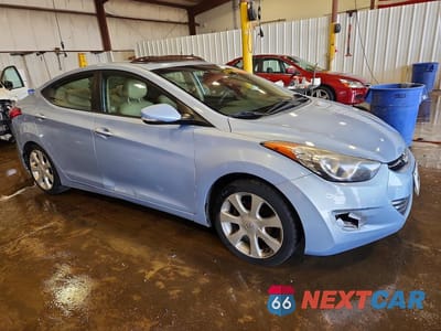 Czwarte zdjęcie samochodu z boku: 2012 HYUNDAI ELANTRA LIMITED VIN:KMHDH4AE0CU432902 - miniatura