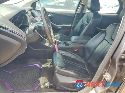Zdjęcie 7 z 12 samochodu: 2014 FORD FOCUS TITANIUM VIN:1FADP3N29EL416455 - miniatura