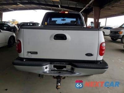 Zdjęcie 6 z 12 samochodu: 2002 FORD F150 VIN:2FTRX08L32CA61890 - miniatura