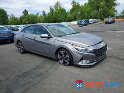 Czwarte zdjęcie samochodu z boku: 2022 HYUNDAI ELANTRA LIMITED VIN:KMHLN4AJ2NU016077 - miniatura