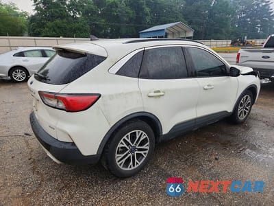 Trzecie zdjęcie samochodu z tyłu: 2020 FORD ESCAPE SEL VIN:1FMCU0H68LUA94292 - miniatura