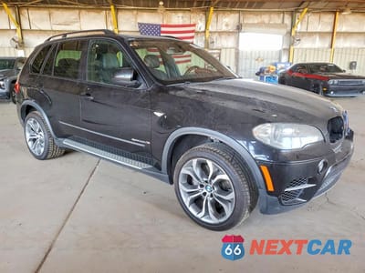 Czwarte zdjęcie samochodu z boku: 2013 BMW X5 XDRIVE50I VIN:5UXZV8C56D0C14691 - miniatura