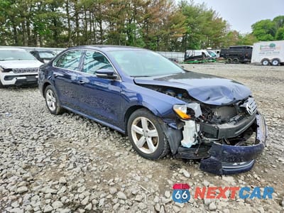 Czwarte zdjęcie samochodu z boku: 2015 VOLKSWAGEN PASSAT S VIN:1VWAT7A36FC101769 - miniatura
