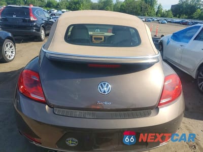 Zdjęcie 6 z 12 samochodu: 2015 VOLKSWAGEN BEETLE 1.8T VIN:3VW517AT0FM821283 - miniatura