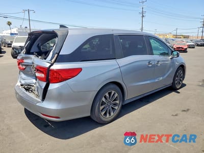 Trzecie zdjęcie samochodu z tyłu: 2021 HONDA ODYSSEY EXL VIN:5FNRL6H71MB011082 - miniatura
