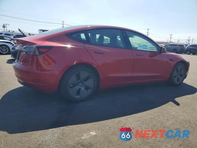 Trzecie zdjęcie samochodu z tyłu: 2023 TESLA MODEL 3 VIN:5YJ3E1EA9PF457214 - miniatura