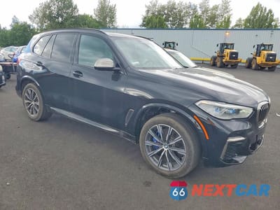 Czwarte zdjęcie samochodu z boku: 2023 BMW X5 M50I VIN:5UXJU4C0XP9R02073 - miniatura