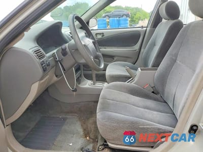 Zdjęcie 7 z 12 samochodu: 2002 TOYOTA COROLLA LE VIN:2T1BR18E82C574147 - miniatura