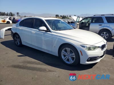 Czwarte zdjęcie samochodu z boku: 2018 BMW 330E VIN:WBA8E1C5XJA758986 - miniatura