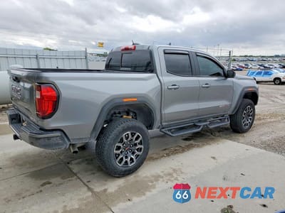 Trzecie zdjęcie samochodu z tyłu: 2024 GMC CANYON AT4X VIN:1GTP6EEK3R1138546 - miniatura