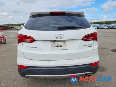 Zdjęcie 6 z 13 samochodu: 2013 HYUNDAI SANTA FE SPORT 2.0T VIN:5XYZUDLA4DG109665 - miniatura