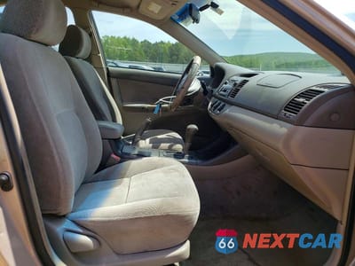 Zdjęcie 7 z 13 samochodu: 2002 TOYOTA CAMRY LE V6 VIN:4T1BF32K32U023416 - miniatura