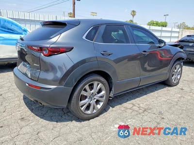 Trzecie zdjęcie samochodu z tyłu: 2022 MAZDA CX-30 SELECT VIN:3MVDMBBL0NM454728 - miniatura