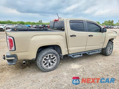 Trzecie zdjęcie samochodu z tyłu: 2021 GMC CANYON AT4 VIN:1GTG6FEN3M1206059 - miniatura