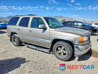 Czwarte zdjęcie samochodu z boku: 2000 GMC YUKON VIN:1GKEK13T0YJ146727 - miniatura
