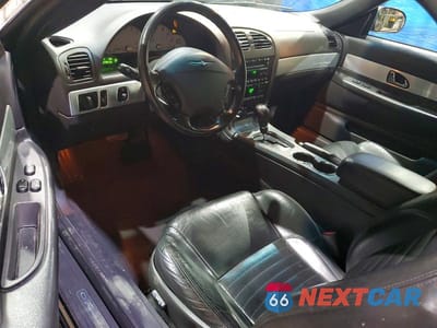 Zdjęcie 8 z 13 samochodu: 2002 FORD THUNDERBIRD VIN:1FAHP60A12Y119700 - miniatura