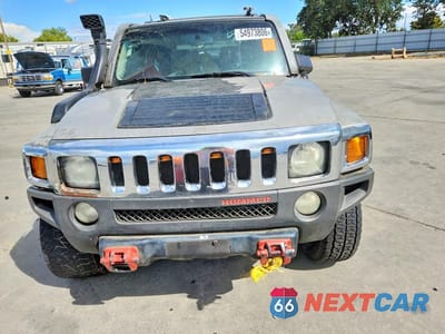 Piąte zdjęcie samochodu w środku: 2009 HUMMER H3 VIN:5GTEN13E598118296 - miniatura