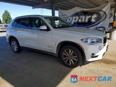 Czwarte zdjęcie samochodu z boku: 2014 BMW X5 SDRIVE35I VIN:5UXKR2C55E0C00883 - miniatura