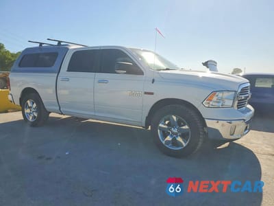 Czwarte zdjęcie samochodu z boku: 2018 RAM 1500 SLT VIN:1C6RR7TM8JS273205 - miniatura