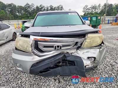 Piąte zdjęcie samochodu w środku: 2011 HONDA PILOT EX VIN:5FNYF3H42BB043785 - miniatura
