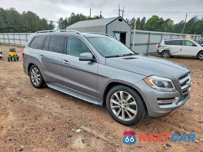 Czwarte zdjęcie samochodu z boku: 2014 MERCEDES-BENZ GL 450 4MATIC VIN:4JGDF7CE3EA353832 - miniatura