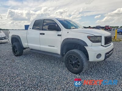 Czwarte zdjęcie samochodu z boku: 2011 TOYOTA TUNDRA DOUBLE CAB SR5 VIN:5TFRM5F16BX034253 - miniatura
