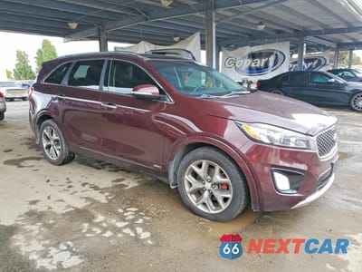 Czwarte zdjęcie samochodu z boku: 2016 KIA SORENTO SX V6 VIN:5XYPKDA50GG121383 - miniatura