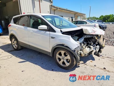 Czwarte zdjęcie samochodu z boku: 2014 FORD ESCAPE SE VIN:1FMCU0GX0EUA93098 - miniatura