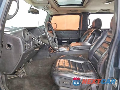 Zdjęcie 7 z 13 samochodu: 2005 HUMMER H2 VIN:5GRGN23U35H100787 - miniatura