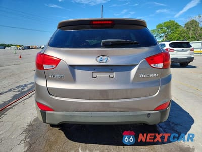 Zdjęcie 6 z 14 samochodu: 2012 HYUNDAI TUCSON GLS VIN:KM8JU3AC9CU499084 - miniatura