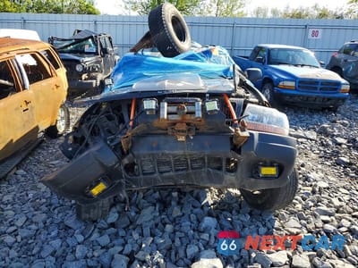 Piąte zdjęcie samochodu w środku: 2001 JEEP GRAND CHEROKEE LAREDO VIN:1J4GW48S51C731382 - miniatura