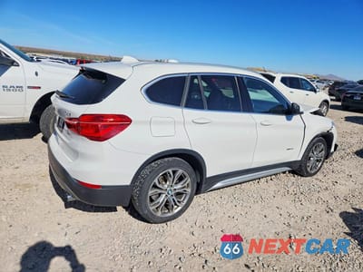 Trzecie zdjęcie samochodu z tyłu: 2017 BMW X1 XDRIVE28I VIN:WBXHT3C37H5F82412 - miniatura