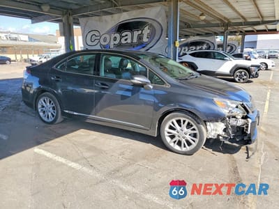 Czwarte zdjęcie samochodu z boku: 2010 LEXUS HS 250H PREMIUM VIN:JTHBB1BA2A2023198 - miniatura